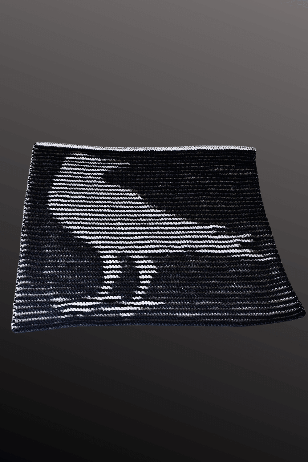 Schattenstrick Decke | Kissen Obsidian King - Rabe