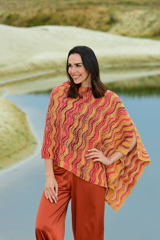 Poncho mit Wellenmuster stricken